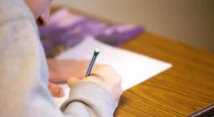 young man studying e1670762978866
